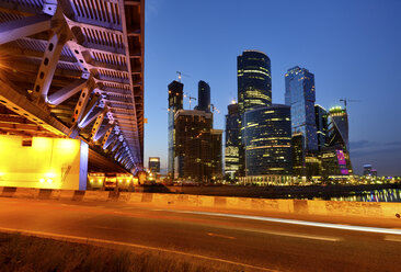 View of skyscrapers and Dorogomilovsky bridge at night, Moscow, Russia - CUF38463