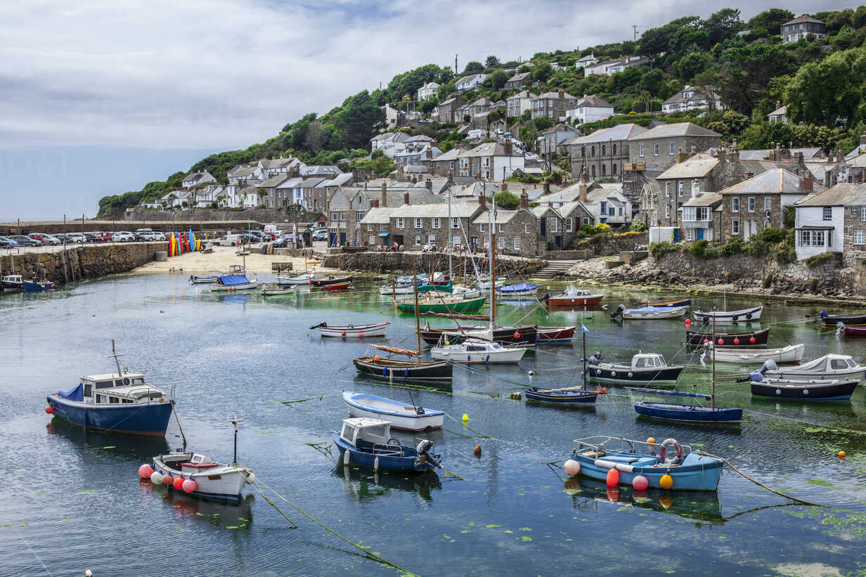 View of fishing boats and harbor, Mousehole, Cornwall, UK stock photo