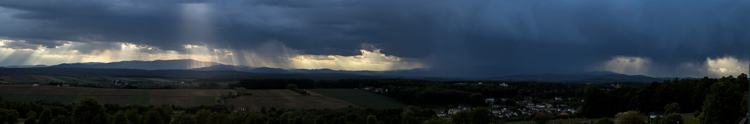 Germany, panoramic view, dark and dramatic cloudy mood during thunderstorm - EJWF00899