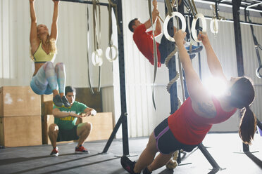 People working out in gym - CUF38781