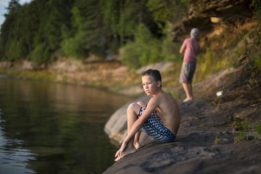 Two teenage boys on lakeside, Lake Superior, Au Train, Michigan, USA - ISF15830