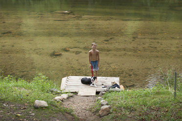 Portrait of teenage boy standing on pier, Canton, North Carolina, USA - ISF15843