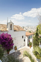 Greece, Attica, Athens, Plaka district, greek chapel and flowering bougainvillea - MAMF00139