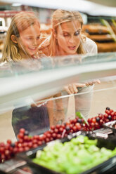 Mother and daughter in grocery store - CUF39224