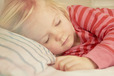 Young girl asleep in bed - CUF39399