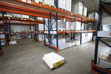 Numbered paper package on pallet in printing warehouse - CUF39549