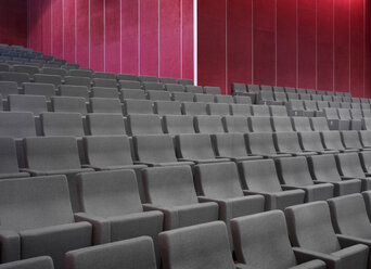 Grey chairs in empty auditorium - CUF39568