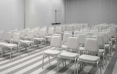 White chairs in empty auditorium - CUF39576