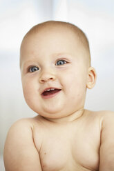 Close up of baby girls smiling face - CUF39742