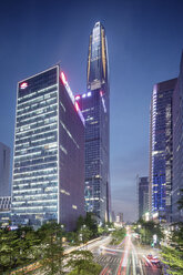 China, Shenzhen, lighted office towers by night - SPP00042