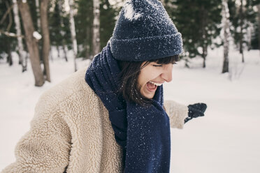 Mid adult woman screaming while playing at park - MASF08174