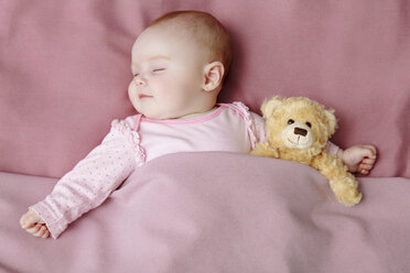 Baby girl sleeping in bed - CUF40329