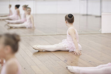 Young ballerina looking at mirror - CUF41917