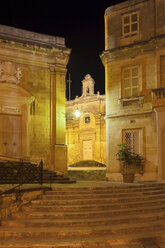 Steps and buildings at night in Birgu, Malta - CUF42121