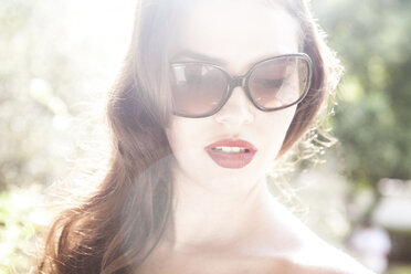 Young woman wearing sunglasses - CUF42305