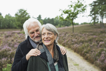 Senior couple, man with hands on woman's shoulders - CUF42756