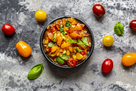 Bowl of tomato basil dip stock photo