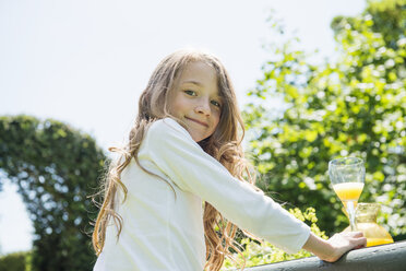 Portrait of girl looking at camera, smiling - CUF43118