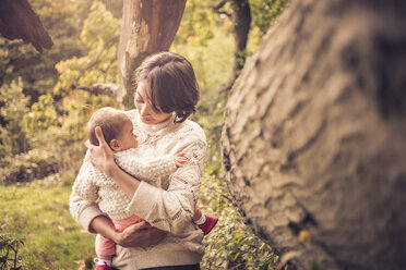 Mother and baby enjoying park - CUF43136