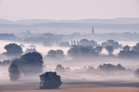 Germany, Baden-Wuerttemberg, Constance district, Radolfzell, view to Radolfzeller Aach in the morning with fog stock photo