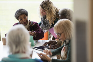 Senior business people talking in conference room meeting - CAIF21254