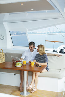 Couple on a sailing trip having a healthy breakfast - EBSF02588