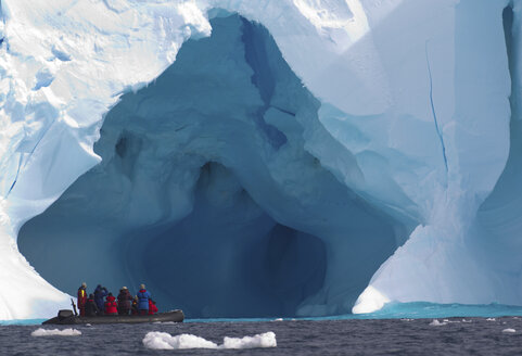 Boat and iceberg, ice floe in the Southern Ocean, 180 miles north of East Antarctica, Antarctica - CUF43596