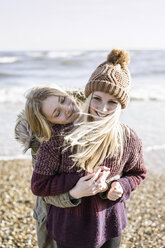 Two girls on the beach in winter. - MINF00967