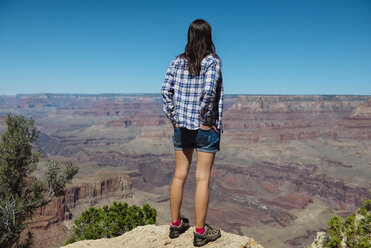 USA, Arizona, Grand Canyon National Park, Grand Canyon, back view of woman looking at view - GEMF02183