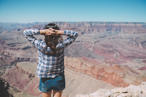 USA, Arizona, Grand Canyon National Park, Grand Canyon, back view of woman looking at view stock photo