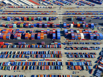 Aerial view of the container port at San Pedro in Los Angeles, with containers awaiting loading. A commercial freight dockyard. - MINF01120