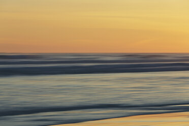 View from the beach over the ocean at sunset, long exposure - MINF01449