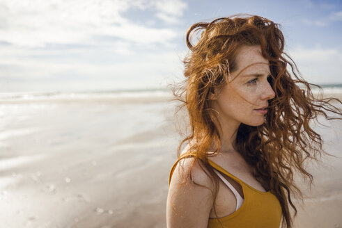 Portrait of a redheaded woman on the beach - KNSF04222