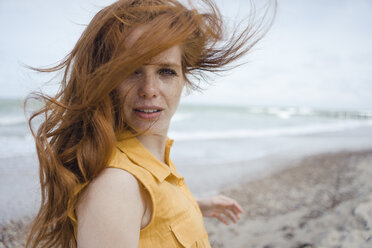 Portrait of a redheaded woman on the beach - KNSF04306
