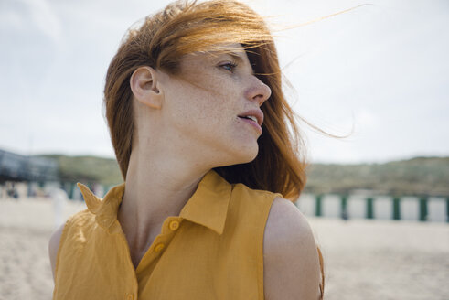 Portrait of a redheaded woman on the beach - KNSF04308