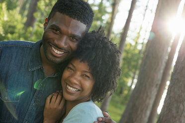 A couple, a man and woman hugging each other. - MINF01876