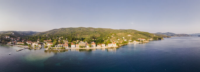 Greece, Aegean Sea, Pagasetic Gulf, Peninsula Pelion, Sound of Trikeri, Aerial view of Chorto in the evening - AMF05850