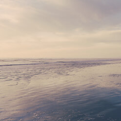 Seascape at dusk off the shores of the Olympic National Park coastline. Ripples on the surface of the sea. - MINF02099