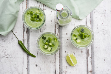 Three glasses and a bottle of homemade green Gazpacho - LVF07337