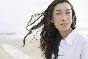 A woman on a beach in Kobe. - MINF02353