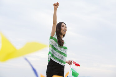 A woman on a beach in Kobe. - MINF02568