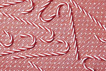 Candy canes on wrapping paper - AZF00049