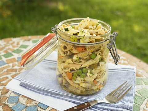 Jar with vegan pasta salad stock photo