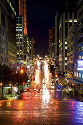 Wet street reflecting city lights - ISF17343