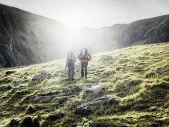 Couple hiking in rocky landscape - ISF17530