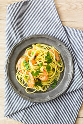 Shrimps with spaghetti on tin plate, overhead view - GIOF04001