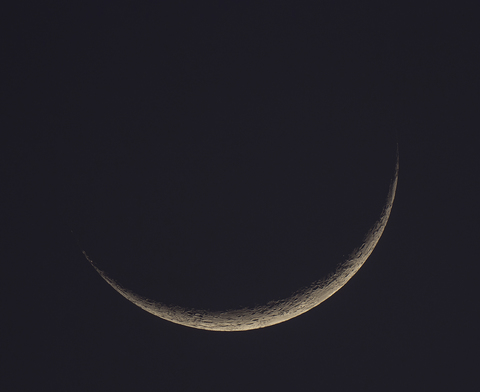 Germany, Hesse, Hochtaunuskreis, new moon crescent with craters stock photo