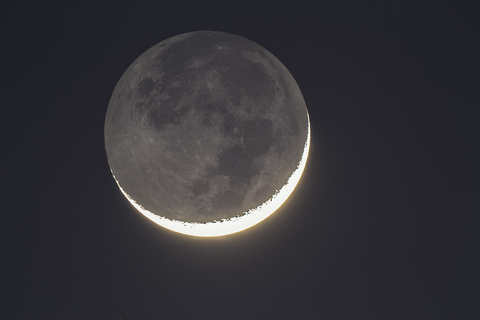 Germany, Hesse, Hochtaunuskreis, grey moon light and bright new moons crescent stock photo