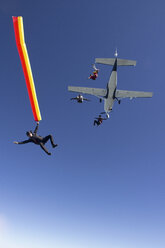 People skydiving from plane - ISF17918