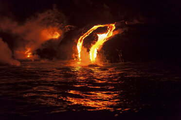 Lava flow into sea at night, Kilauea volcano, Hawaii - ISF18211